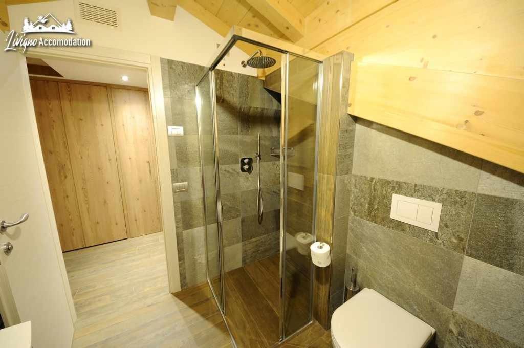 Alpen Flower By Livigno Accomodation Номер фото